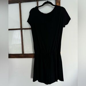 Black Romper, fits like M/L. Purchased from Amazon. NWOT.